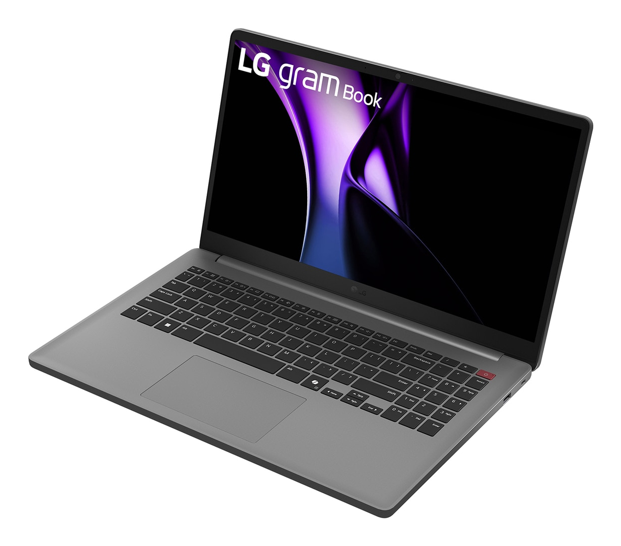 Un computer portatile grigio con tastiera nera e sfondo viola.