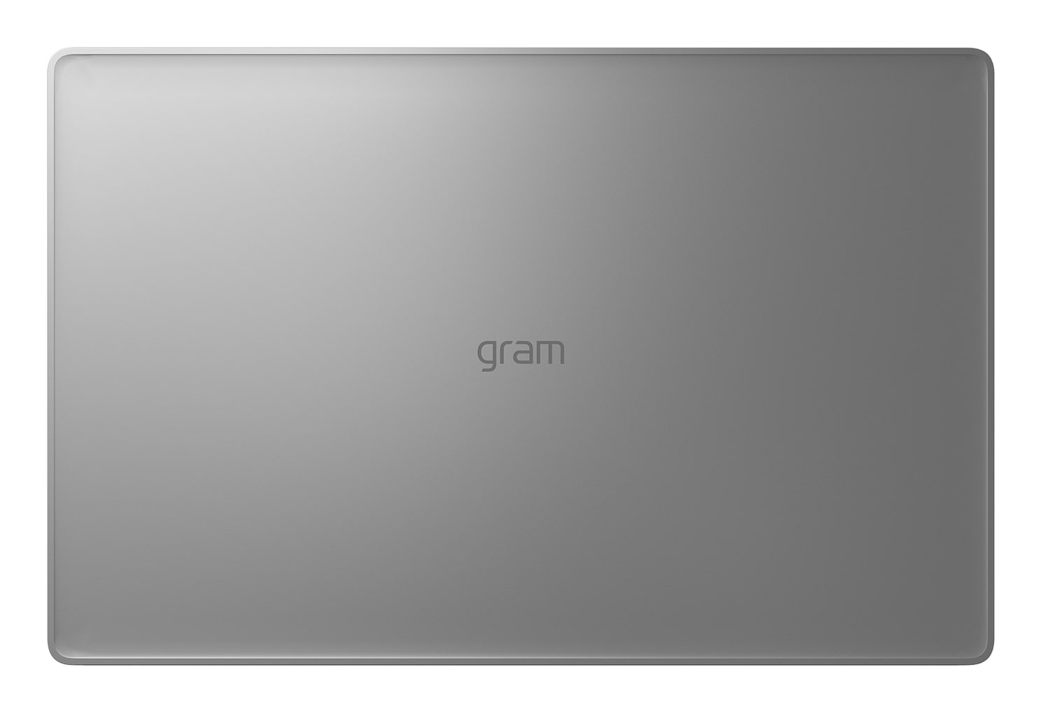 La parte superiore grigia chiusa di un computer portatile con la scritta gram al centro.