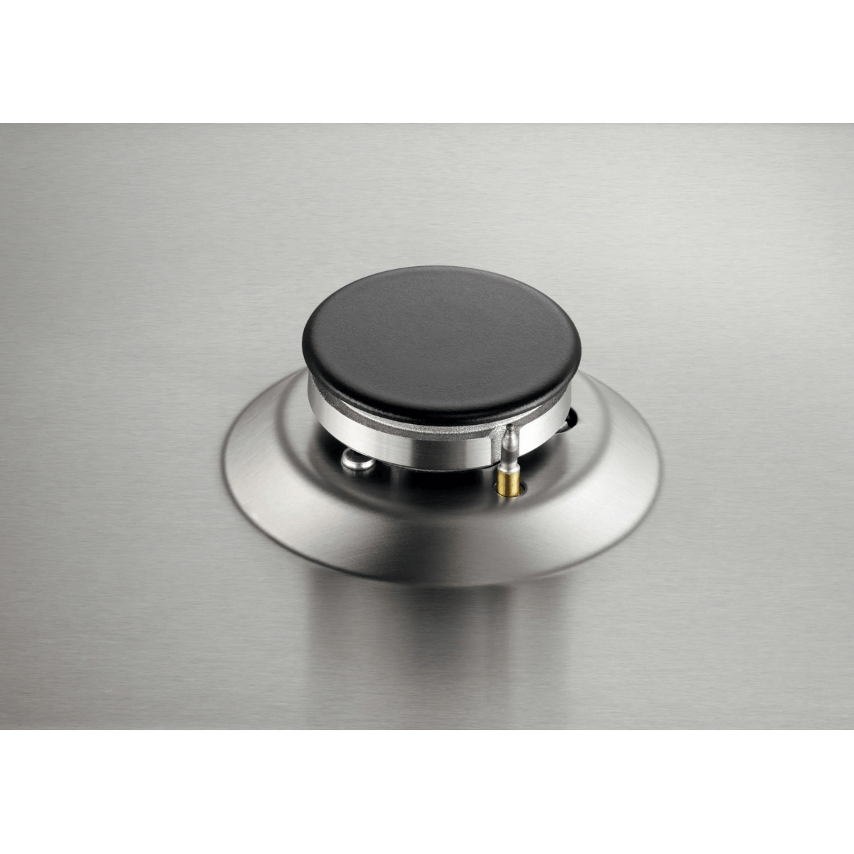 A single black and silver gas burner on a brushed stainless steel surface.
