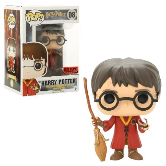 Harry Potter Funko Pop Figur mit Besen und Schnatz neben seiner Originalverpackung.