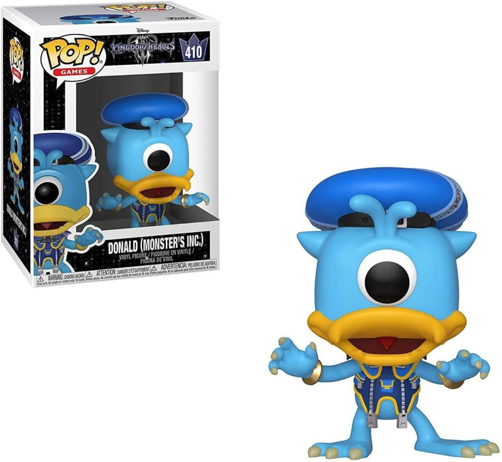 Figurine Funko Pop de Donald Duck en monstre bleu borgne avec un chapeau, à côté de sa boîte.