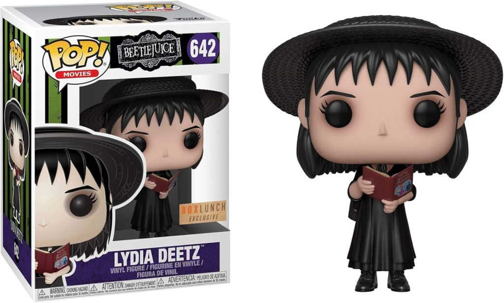 Lydia Deetz Pop!-Vinylfigur mit Hut und rotem Buch im Displaykarton.
