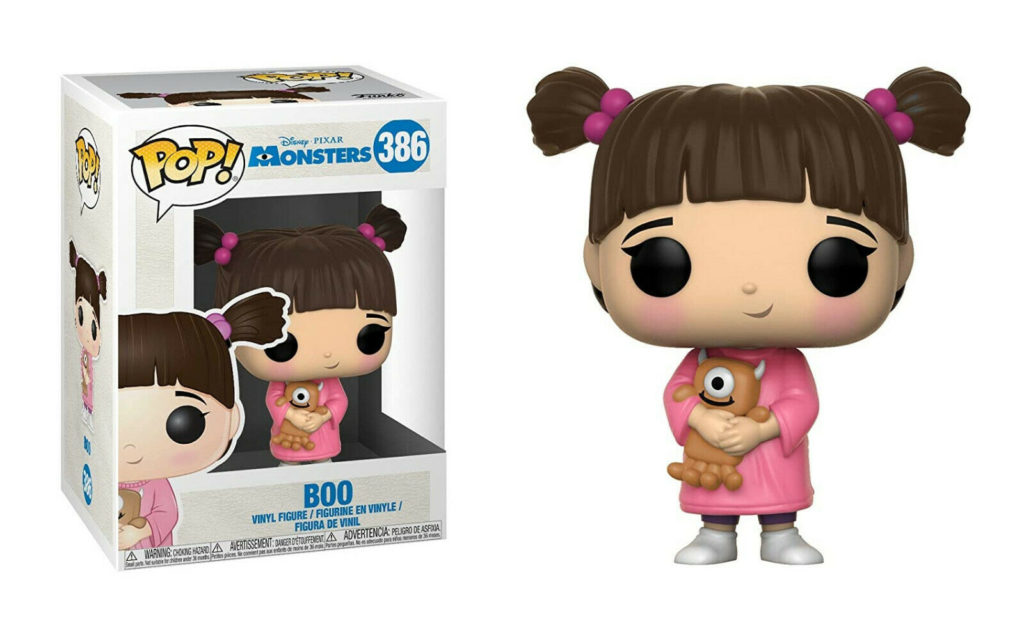 Figura de vinilo Funko Pop de Boo sosteniendo un pequeño juguete de Mike Wazowski, junto a su caja.