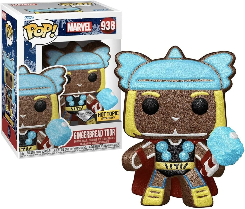 Gingerbread Thor Funko Pop Figur mit blauer Rüstung und Hammer neben der Originalverpackung.