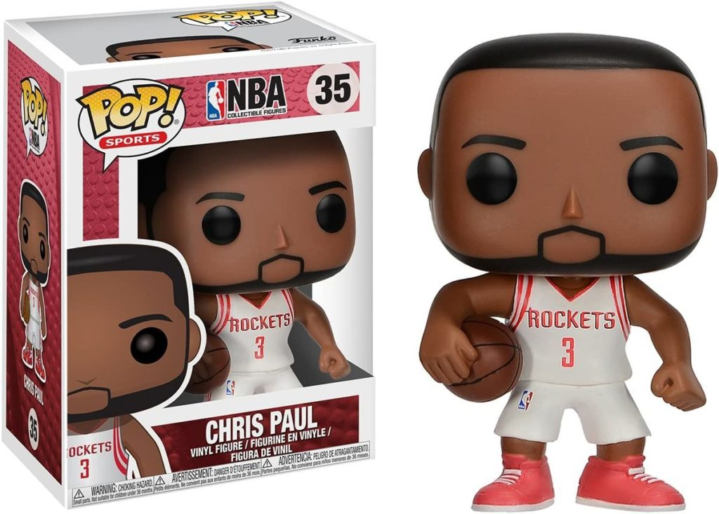 Chris Paul Funko Pop Figur in Rockets-Trikot Nummer 3 mit Basketball neben der Verpackung.