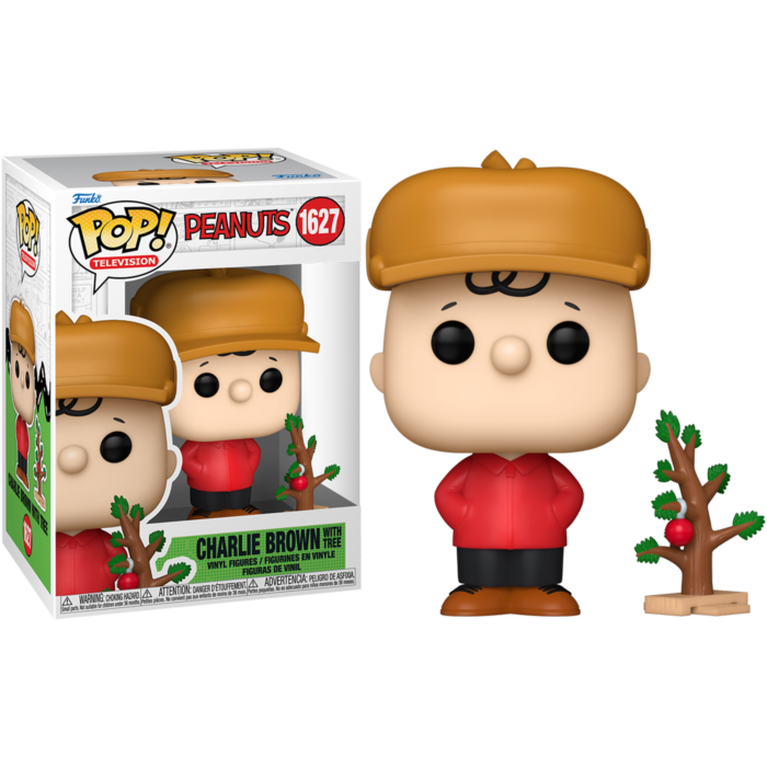 Figura de Charlie Brown Pop! con chaqueta roja, gorro y un pequeño árbol de navidad junto a su caja.