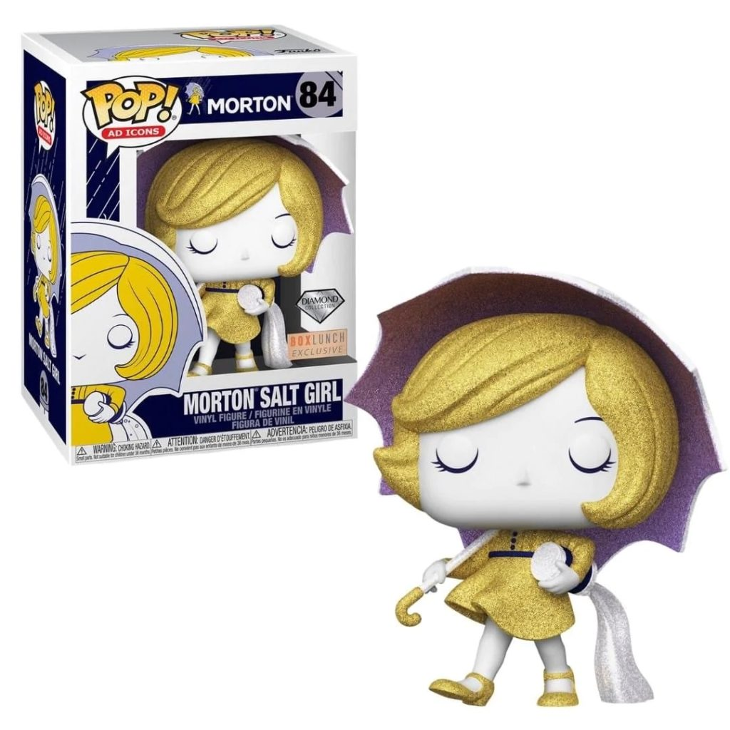 Funko Pop Figur des Morton Salzmädchens mit gelbem Kleid und Regenschirm, neben der originalen Verpackung.