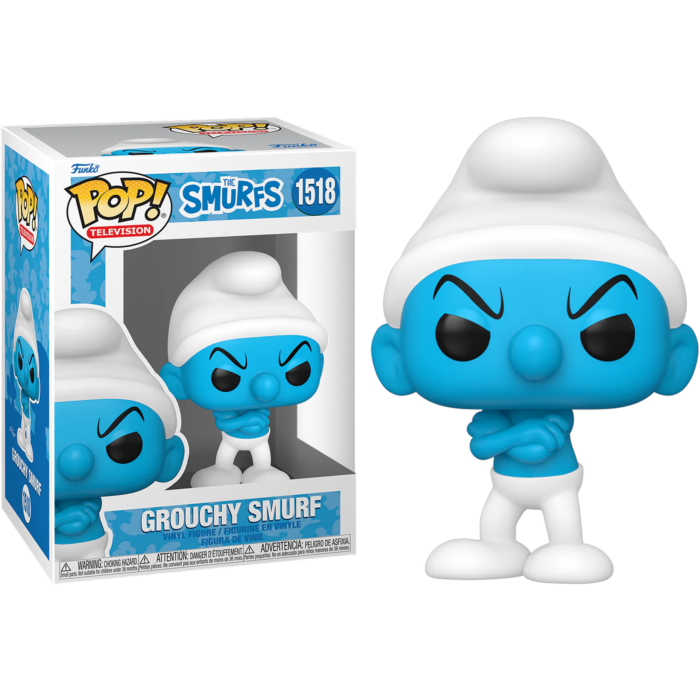 Una figura Funko Pop de Pitufo Gruñón azul con los brazos cruzados al lado de su caja.