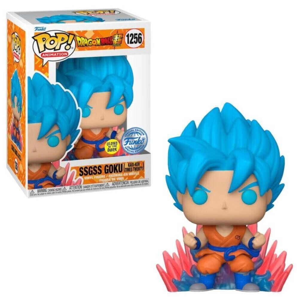 Eine SSGSS Goku Funko Pop Figur mit blauen Haaren und roter Aura neben ihrer originalen Verpackung.