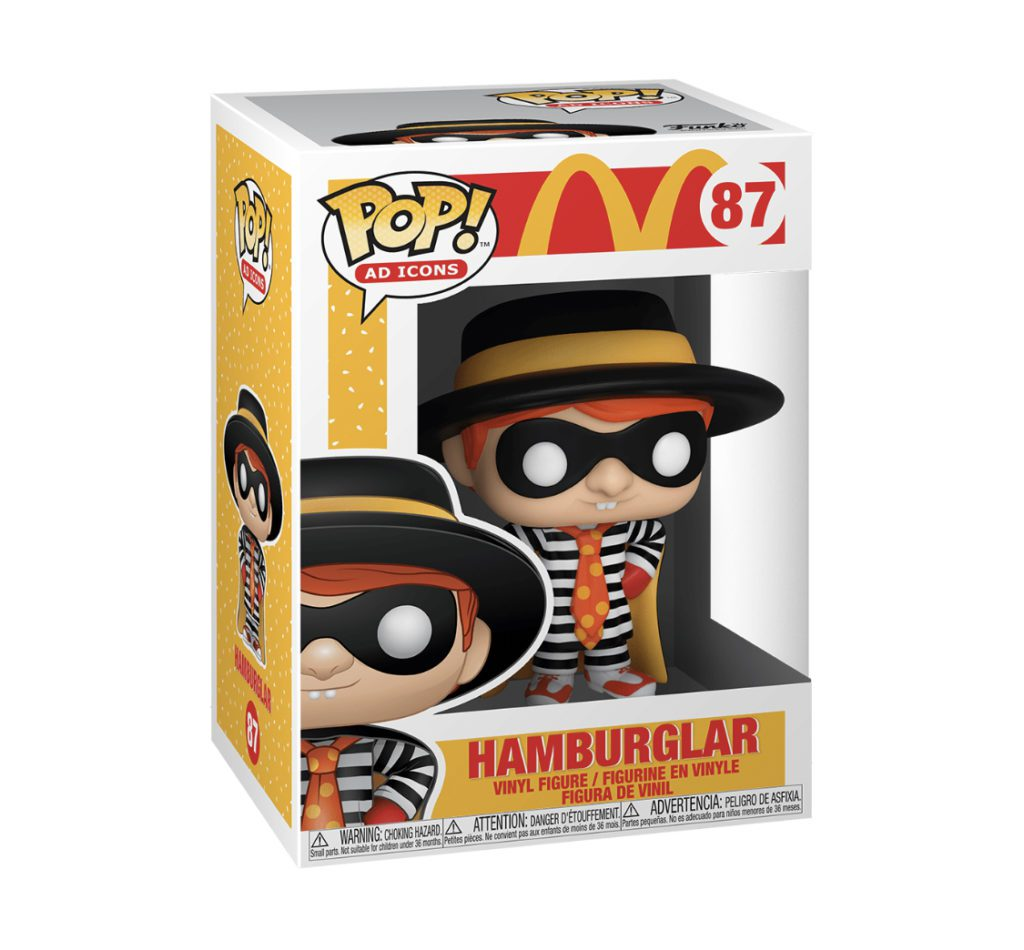 Eine Funko-Pop-Vinylfigur von Hamburglar in einer Schachtel mit schwarz-weißen Streifen.