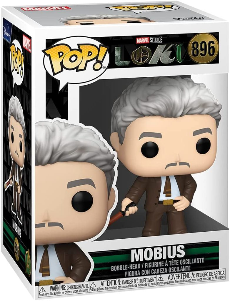 Funko Pop Figur von Mobius aus Loki im Karton, mit grauem Haar, braunem Anzug und Schnurrbart.