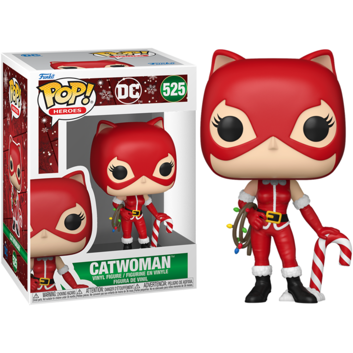 Figura Funko Pop de Catwoman con traje navideño rojo, bastón de caramelo y luces junto a su caja.