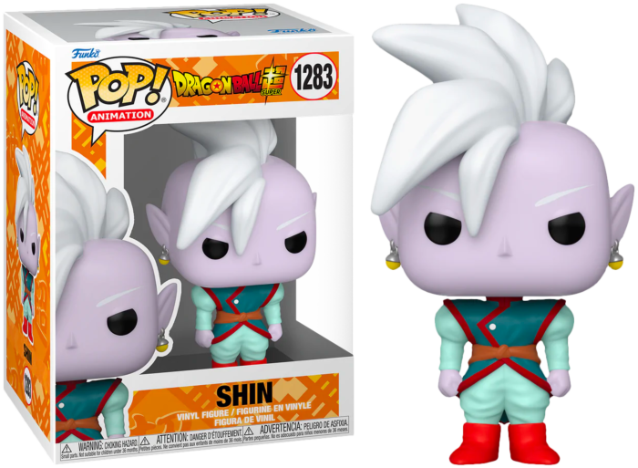 Funko Pop Shin Vinyl-Figur mit lila Haut, weißen Haaren und türkisfarbener Tunika neben ihrer Schachtel.