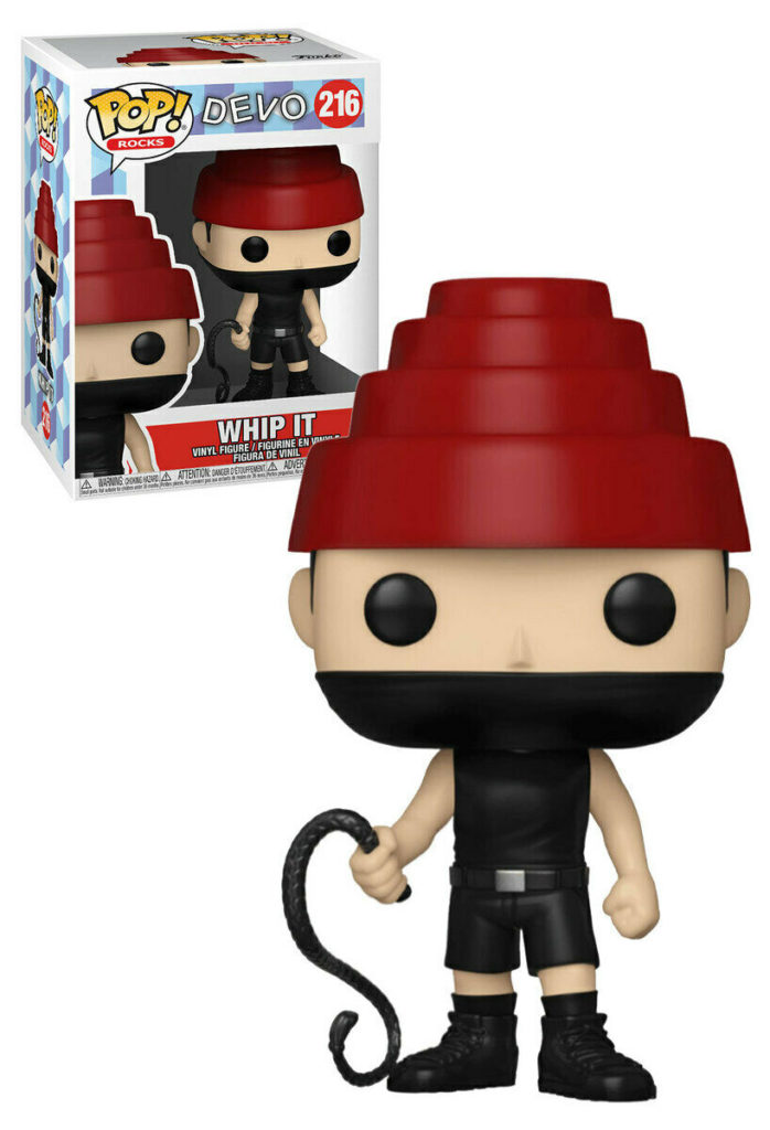 Funko Pop Devo Actionfigur mit rotem Hut und Peitsche, vor der Originalverpackung.