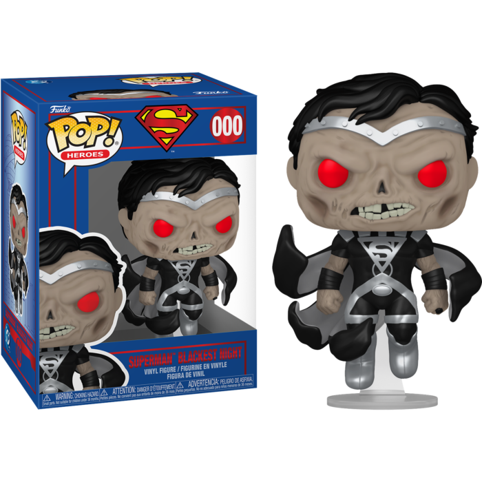 Una figura de vinilo Funko Pop Superman Blackest Night con ojos rojos brillantes al lado de su caja.