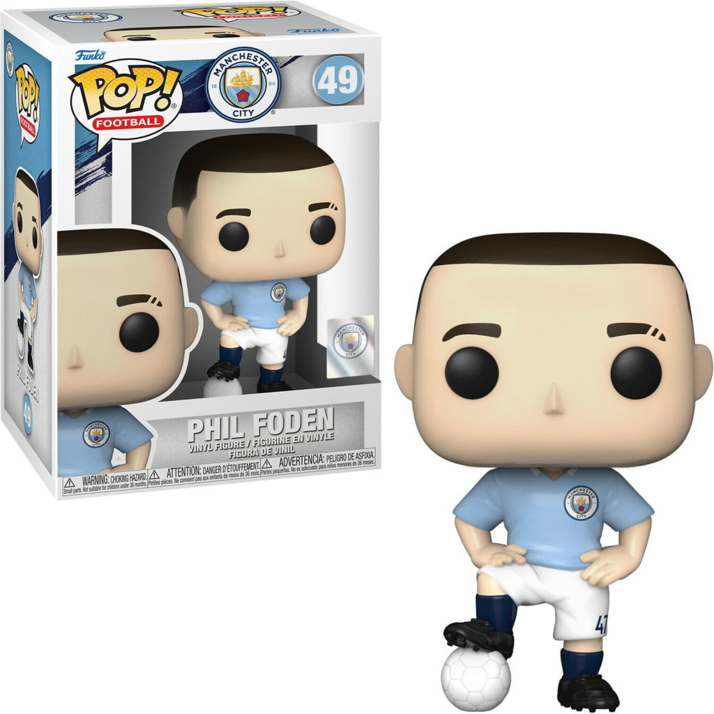 Phil Foden Pop! Vinyl-Figur in Manchester-City-Trikot neben der Box.