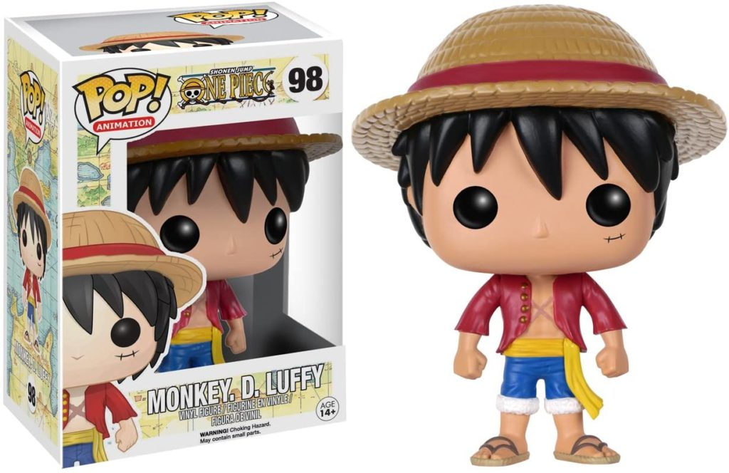 Figurka winylowa Funko Pop Monkey D. Luffy obok pudelka.