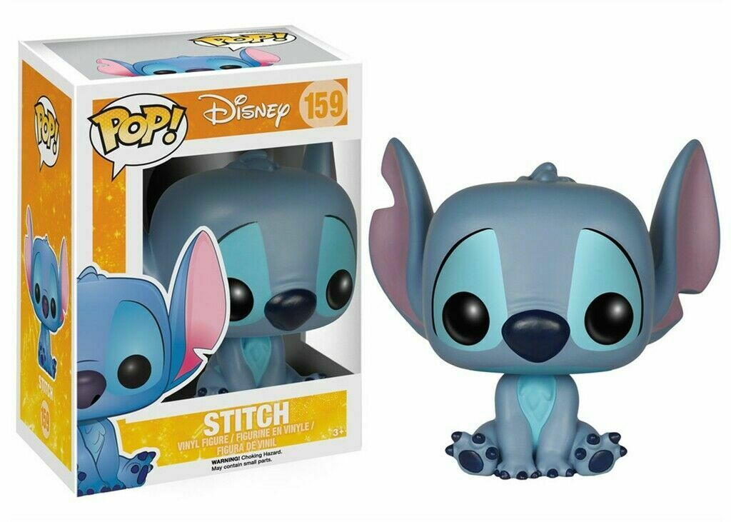 Eine blaue Stitch Funko Pop Vinyl-Figur mit großen Ohren sitzt neben ihrer bunt bedruckten Originalverpackung.
