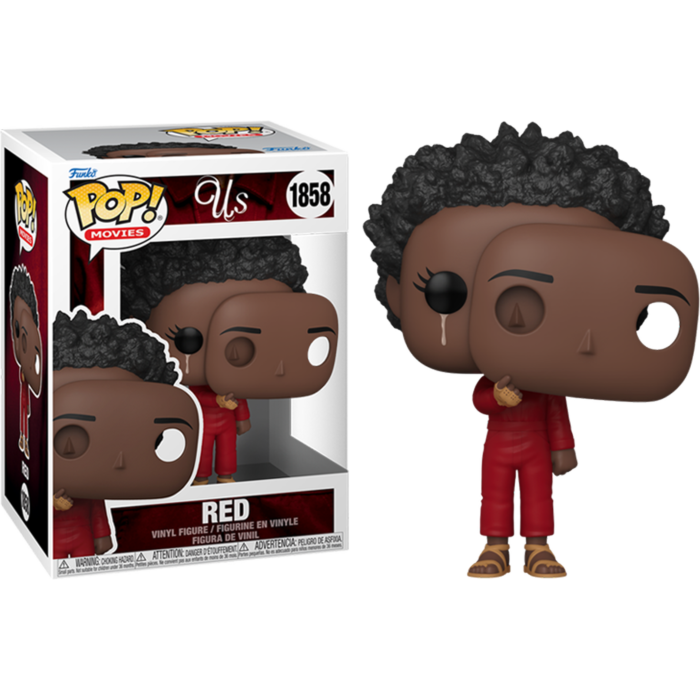 Figurine en vinyle Red Funko Pop tenant un masque à côté de sa boîte sur fond noir.