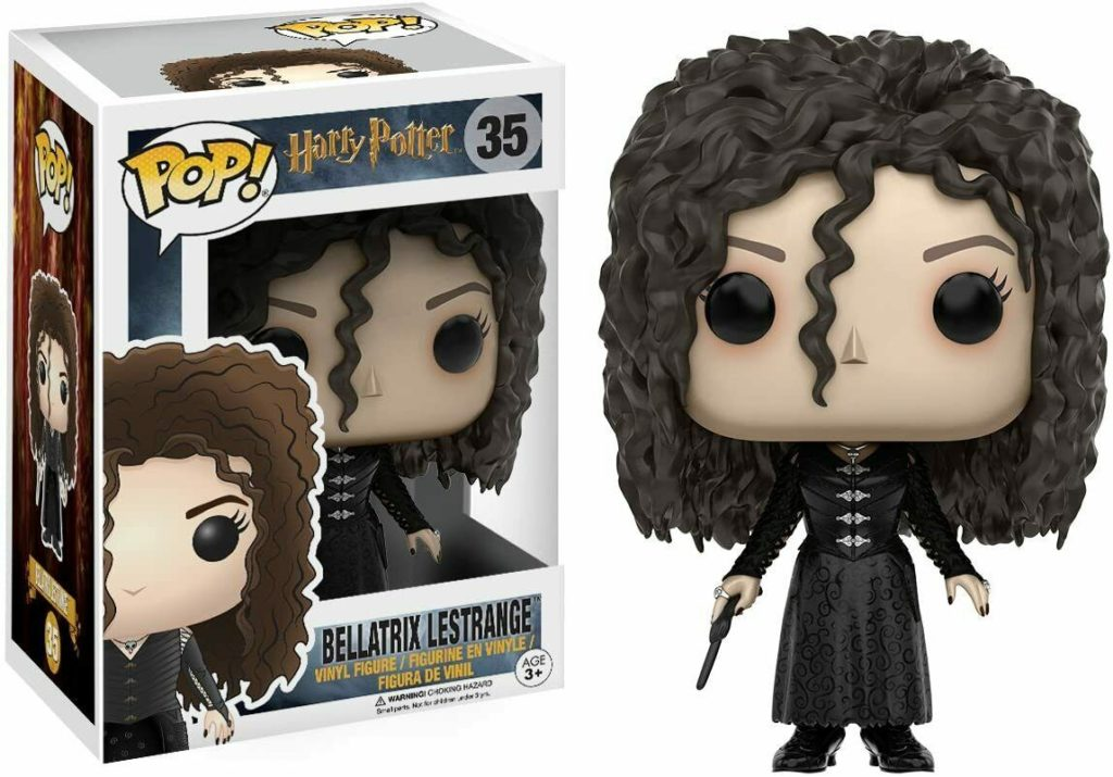 Figurka winylowa Funko Pop Bellatrix Lestrange w czarnej sukni z różdżką obok opakowania.