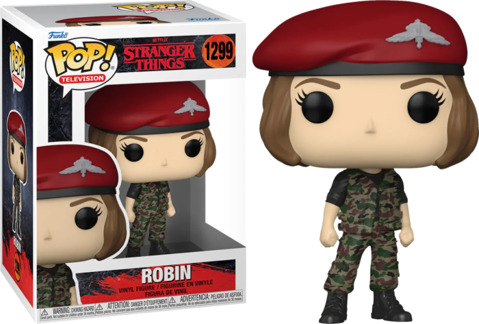 Stranger Things Robin Funko Pop Figur mit roter Beret und Tarnkleidung neben ihrer Box.