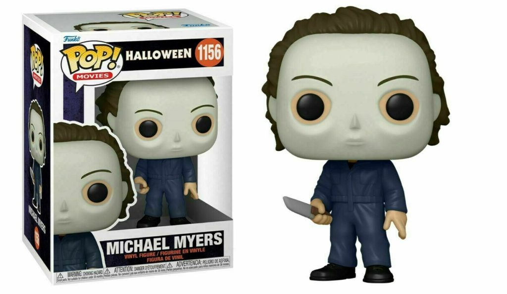 Michael Myers Funko Pop Vinyl Figur in blauer Kleidung mit Messer, neben seiner Verpackung.