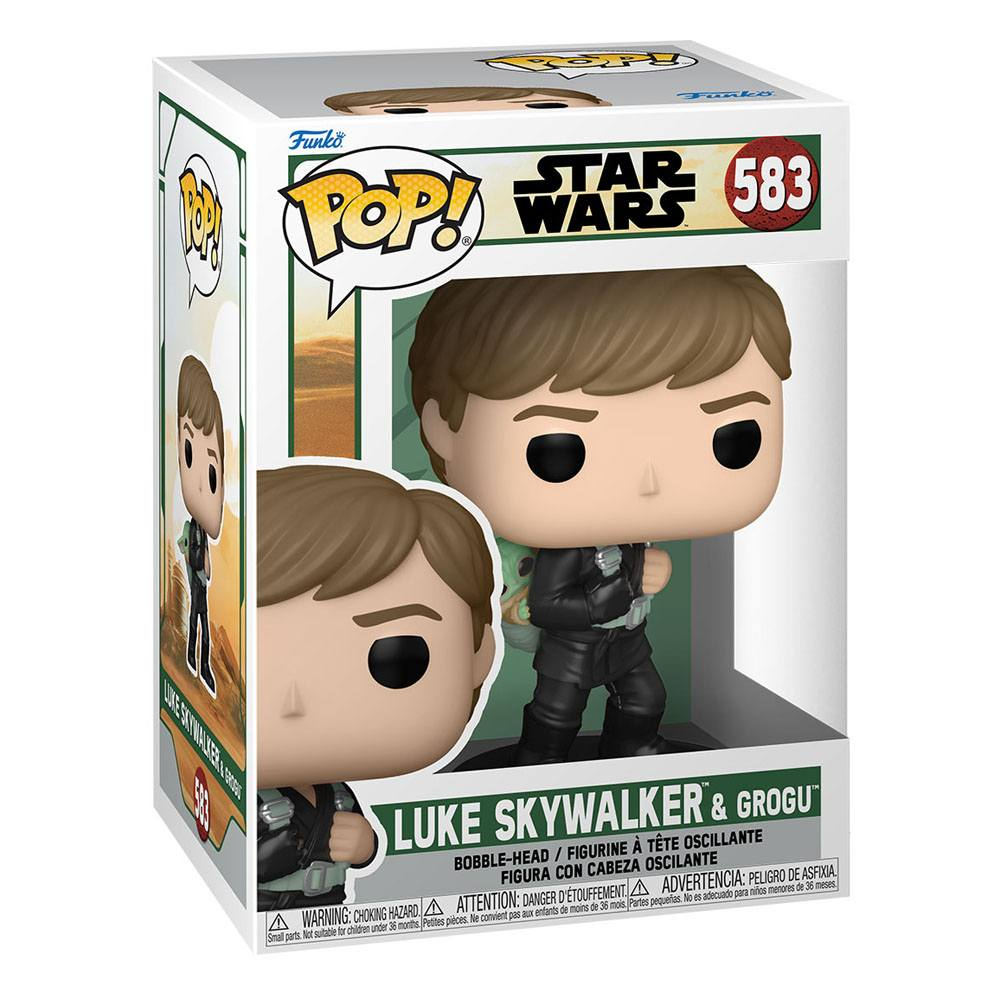 Figurine Funko Pop! de Luke Skywalker et Grogu dans sa boîte d'origine, numérotée 583.