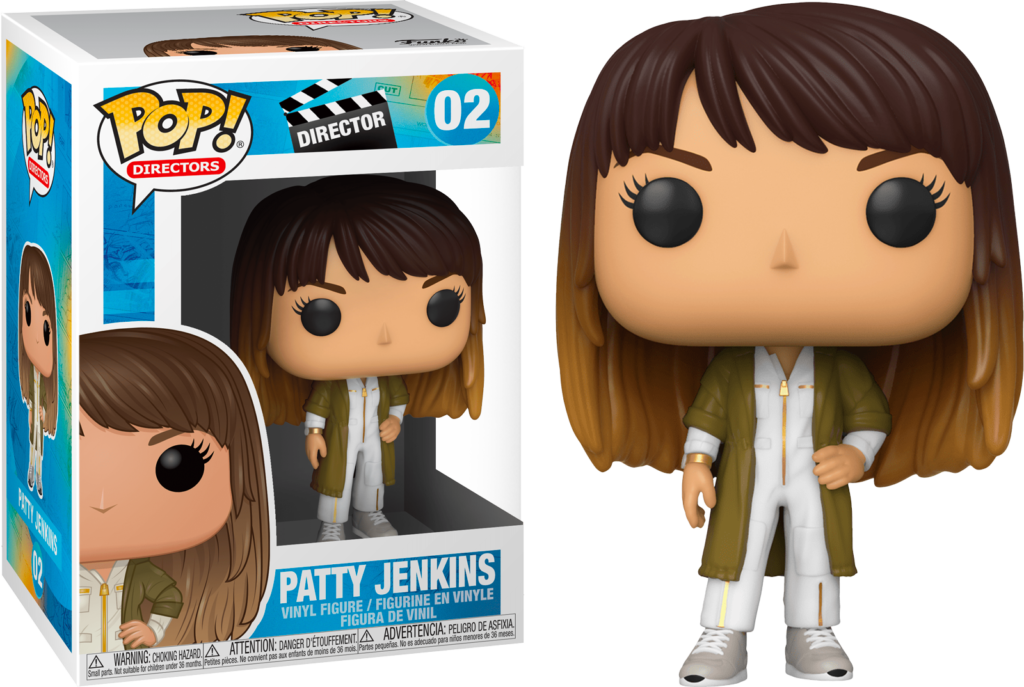 Patty Jenkins Pop! Vinyl-Figur mit braunem Ombre-Haar, weißem Outfit und olivgrünem Mantel, in und außerhalb der Box.