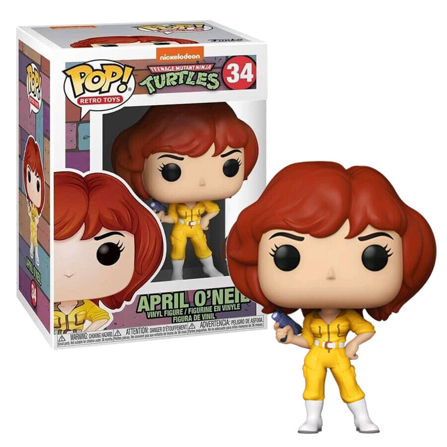 April O'Neil Funko Pop Figur in gelbem Jumpsuit mit blauer Waffe und Verpackung.