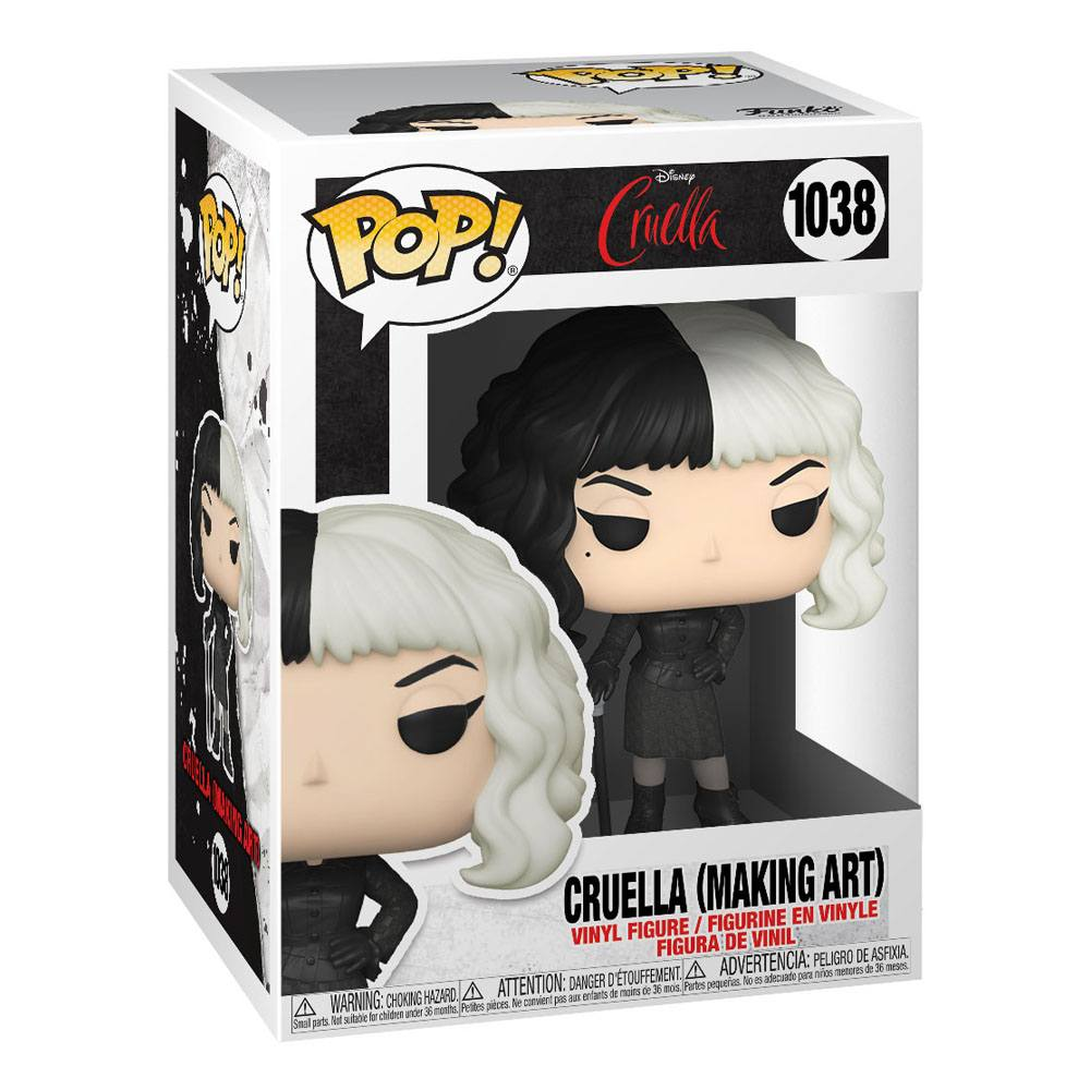 Funko Pop! figura numero 1038 di Cruella in abiti bianchi e neri e acconciatura coordinata in scatola.