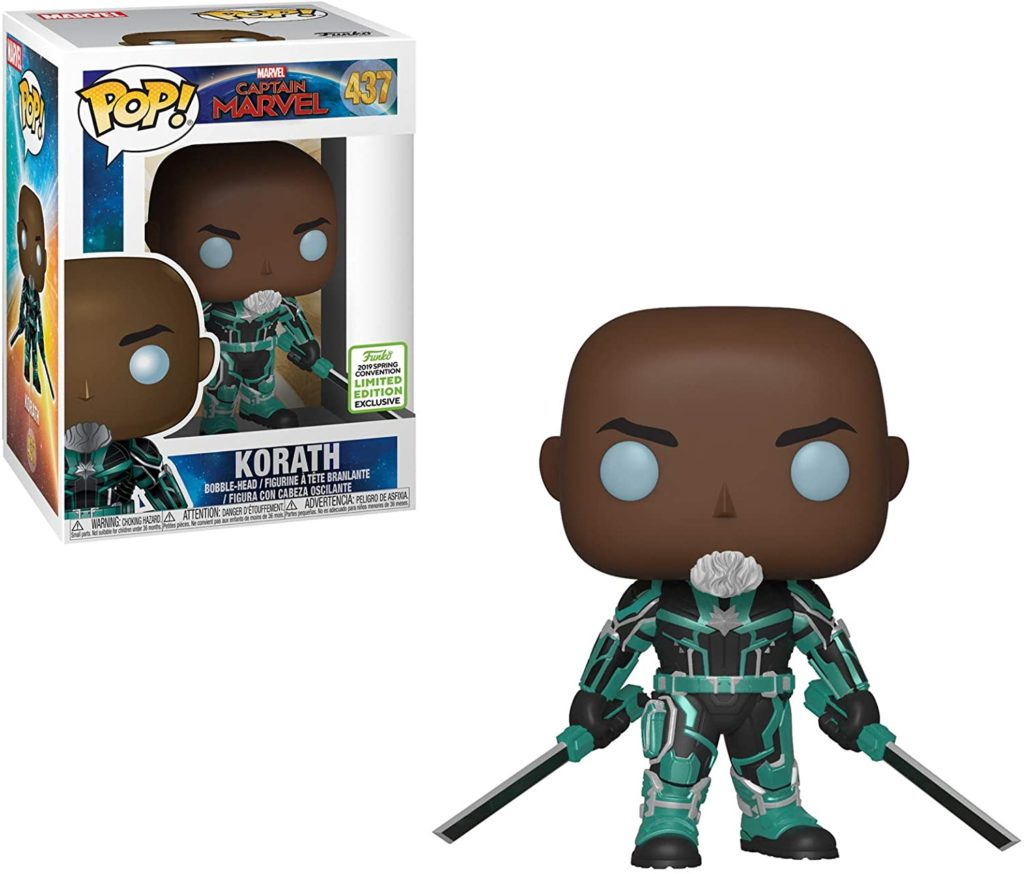 Funko Pop Korath-Figur in schwarz-türkiser Rüstung mit Schwertern und Verpackung.