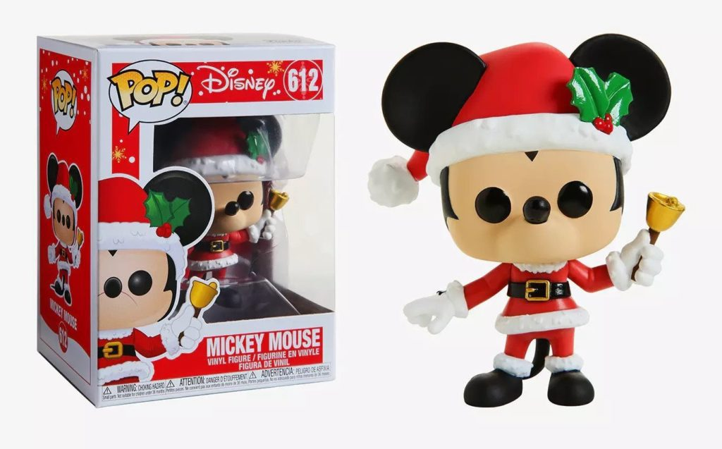Mickey-Mouse-Sammelfigur als Weihnachtsmann mit Glocke, daneben die originale Verpackung.