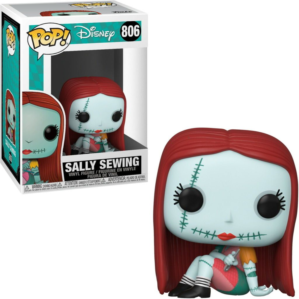 Funko Pop Figur von Sally aus Nightmare Before Christmas nähend vor ihrer Verpackung.