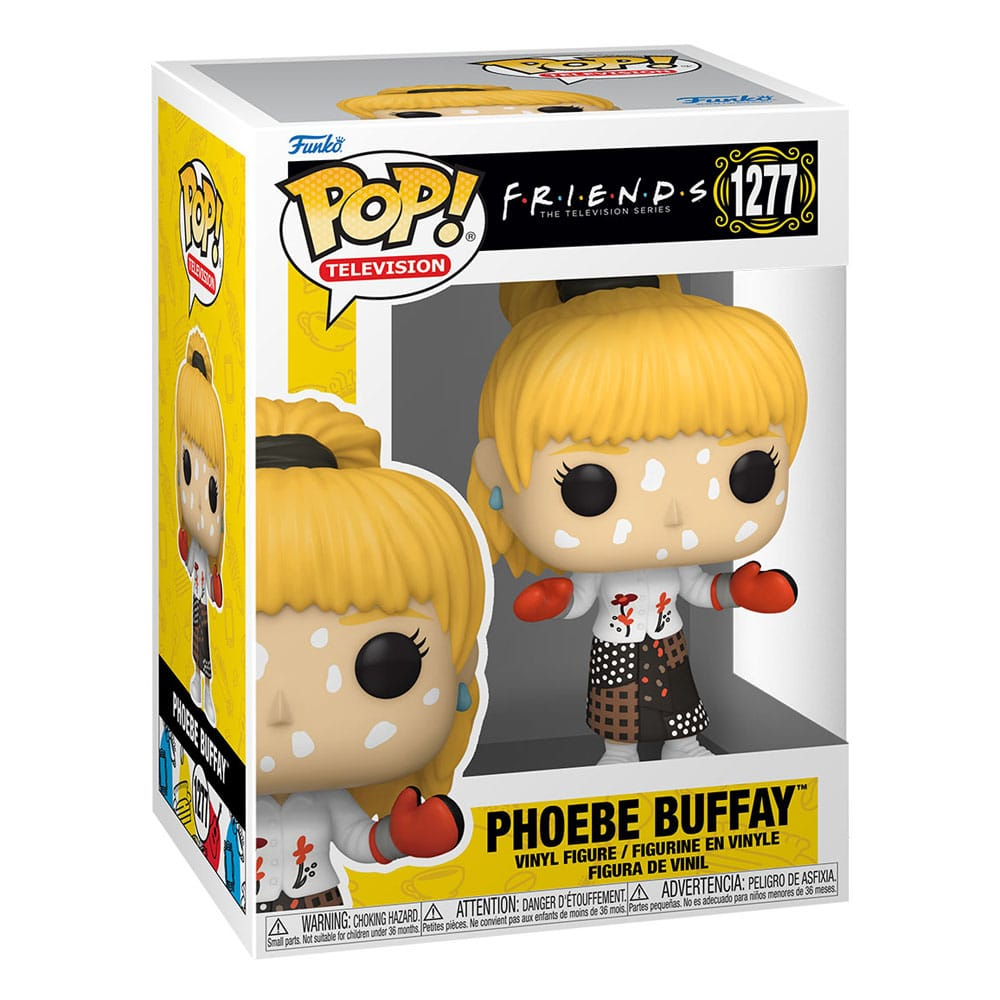Figurine en vinyle Funko Pop de Phoebe Buffay de Friends dans sa boîte, avec des taches blanches sur le visage et des gants rouges.