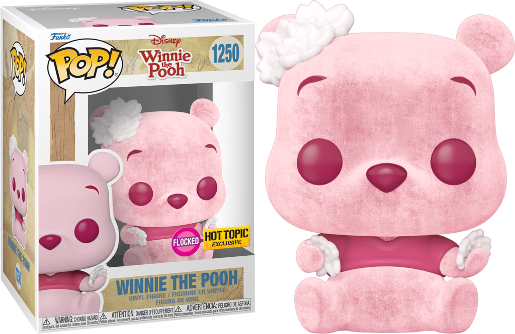 Eine rosa Winnie Puuh Funko Pop Vinyl-Figur mit einer weißen Blume, neben ihrer Verpackung.