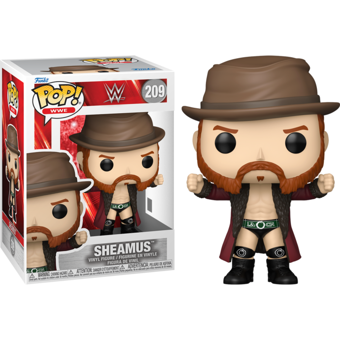 Una figura de vinilo Funko Pop WWE Sheamus con sombrero marrón, abrigo rojo y equipo de lucha negro junto a su caja.
