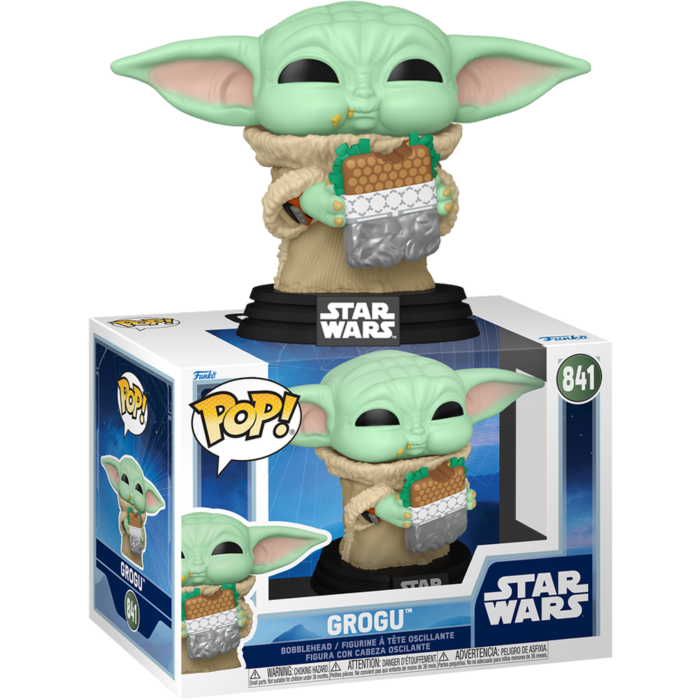 Figura Funko Pop de Grogu de Star Wars con galleta en su caja.