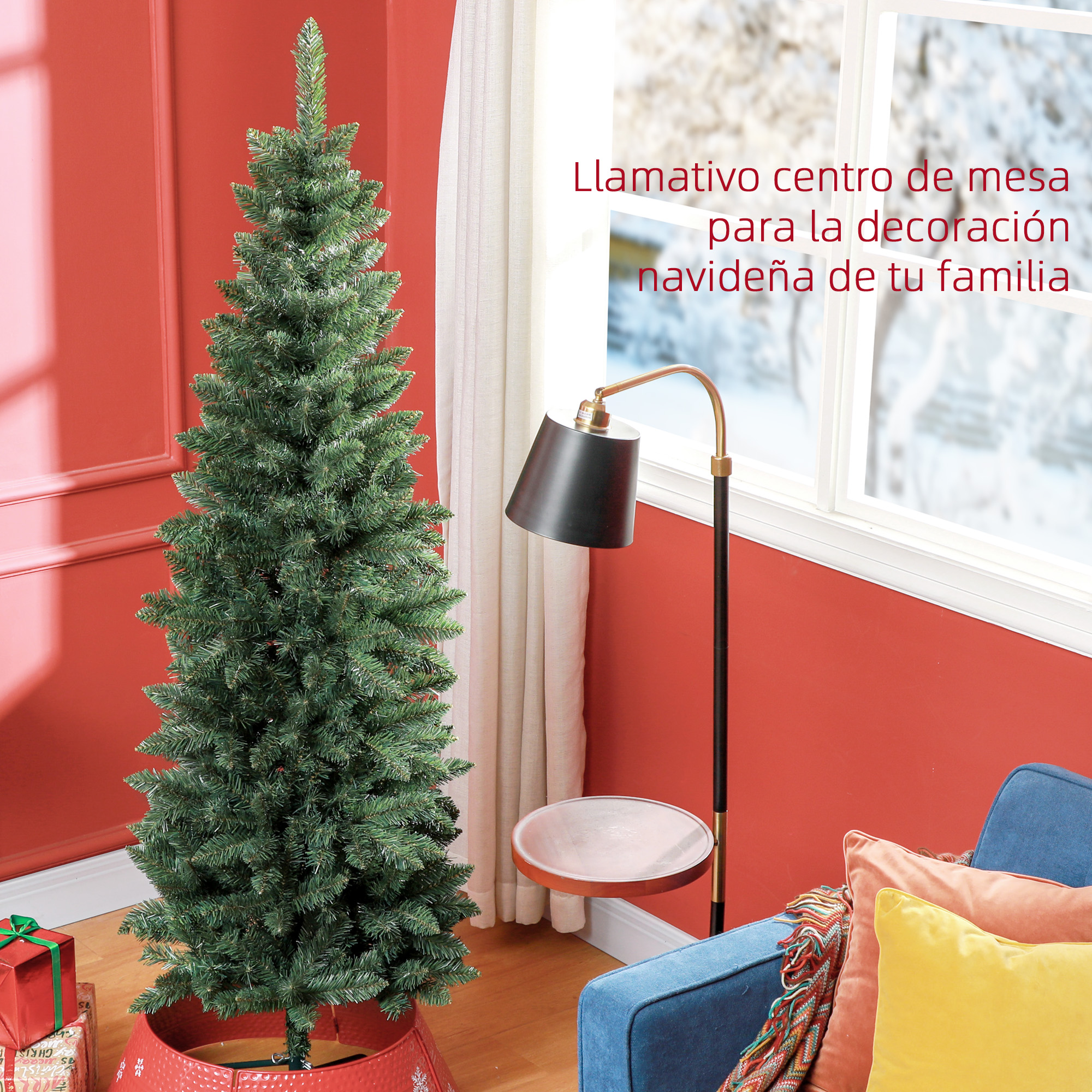 Un árbol de Navidad artificial delgado junto a una ventana, una lámpara y cojines coloridos.