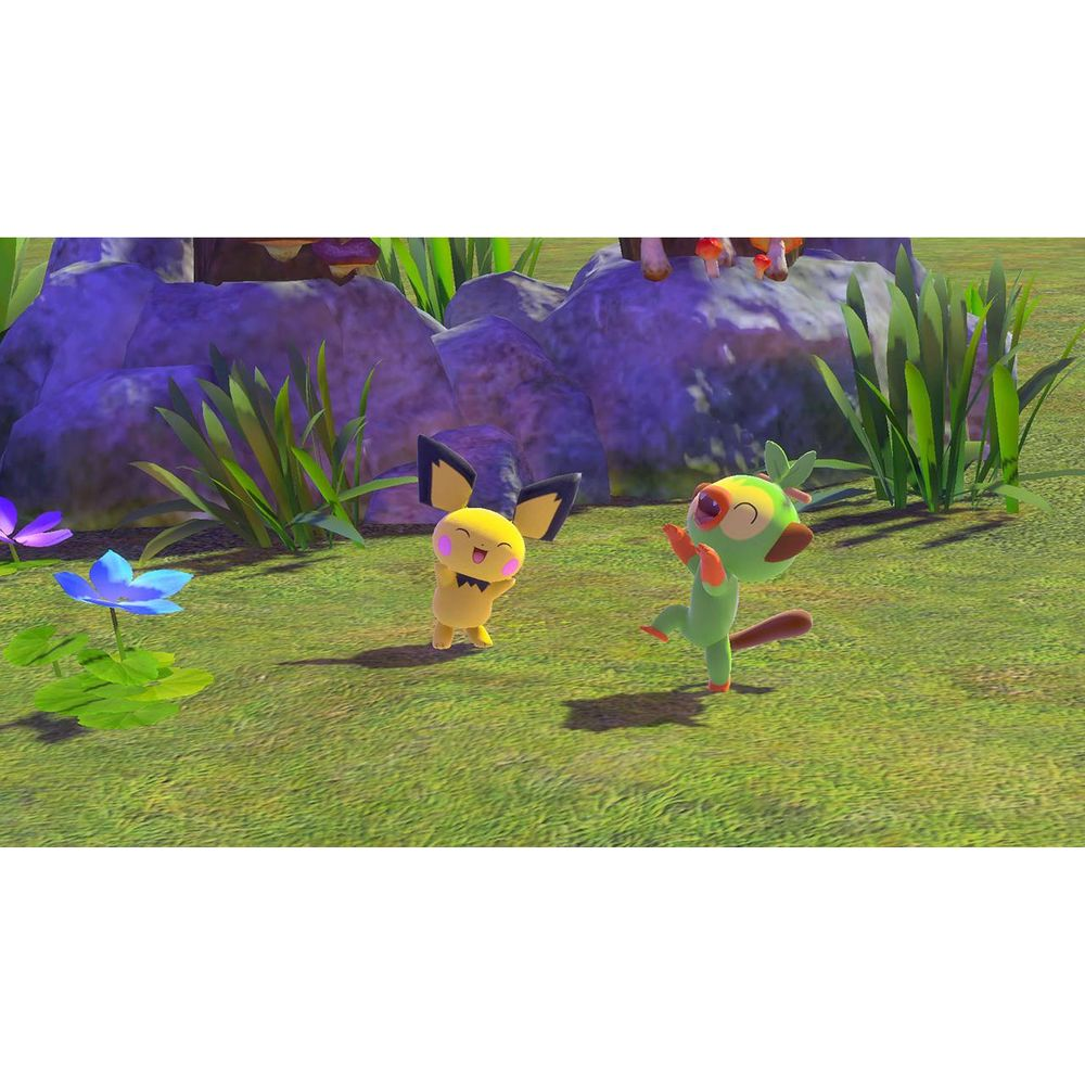 Due allegri personaggi Pokémon danzano su un prato erboso con rocce, fiori e alta erba verde sullo sfondo.