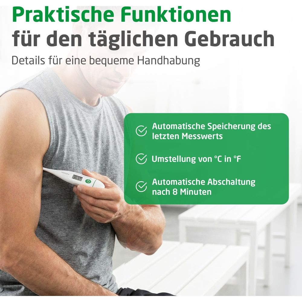Ein Mann misst seine Temperatur mit einem digitalen Thermometer unter dem Arm.