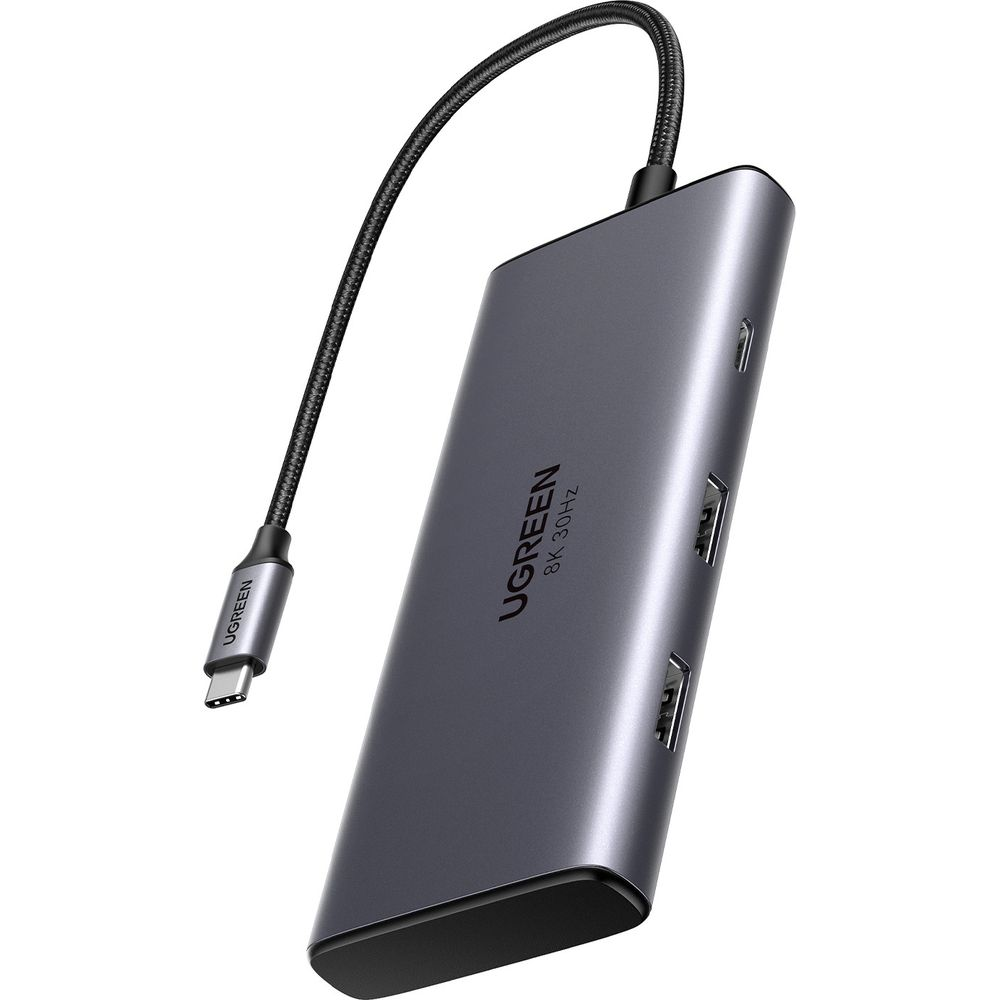 Szary hub wieloportowy USB-C UGREEN z plecionym kablem na białym tle.