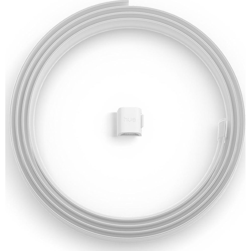 Una striscia LED Philips Hue bianca arrotolata circonda un piccolo connettore su sfondo bianco.