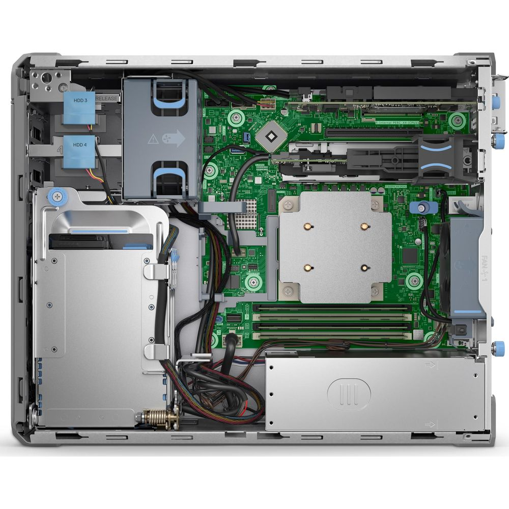 Tower di computer aperto con scheda madre verde, dissipatore CPU, alloggiamenti per dischi e cavi.