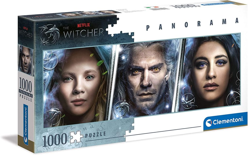 Scatola puzzle panoramica da 1000 pezzi di The Witcher con ritratti di Ciri, Geralt e Yennefer.