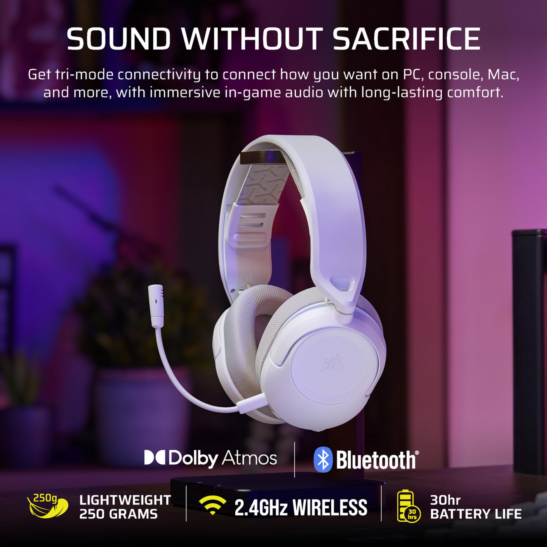 Cuffie gaming bianche su supporto con microfono, Dolby Atmos, Bluetooth e wireless a 2,4 GHz.