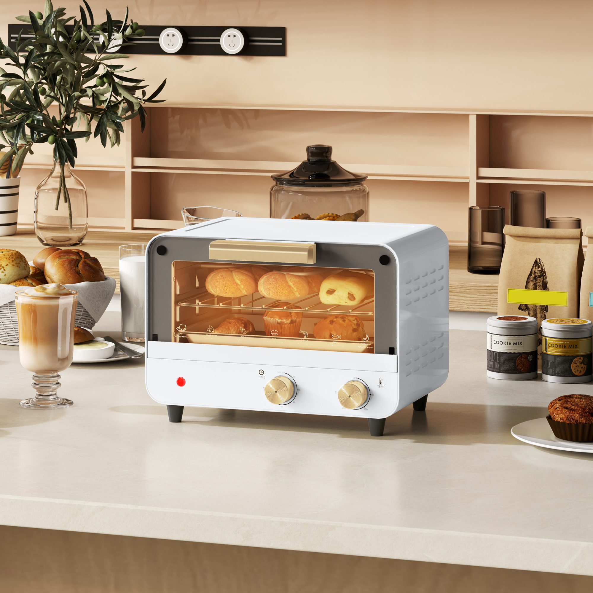 Un mini forno bianco su un bancone da cucina cuoce dolci, con un bicchiere di latte macchiato e ingredienti.
