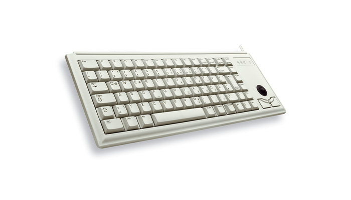 Un teclado de computadora beige con una bola de seguimiento negra integrada a la derecha, sobre fondo blanco.
