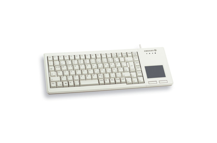 A beige Cherry computer keyboard with an integrated touchpad and gray keys, on a white background.