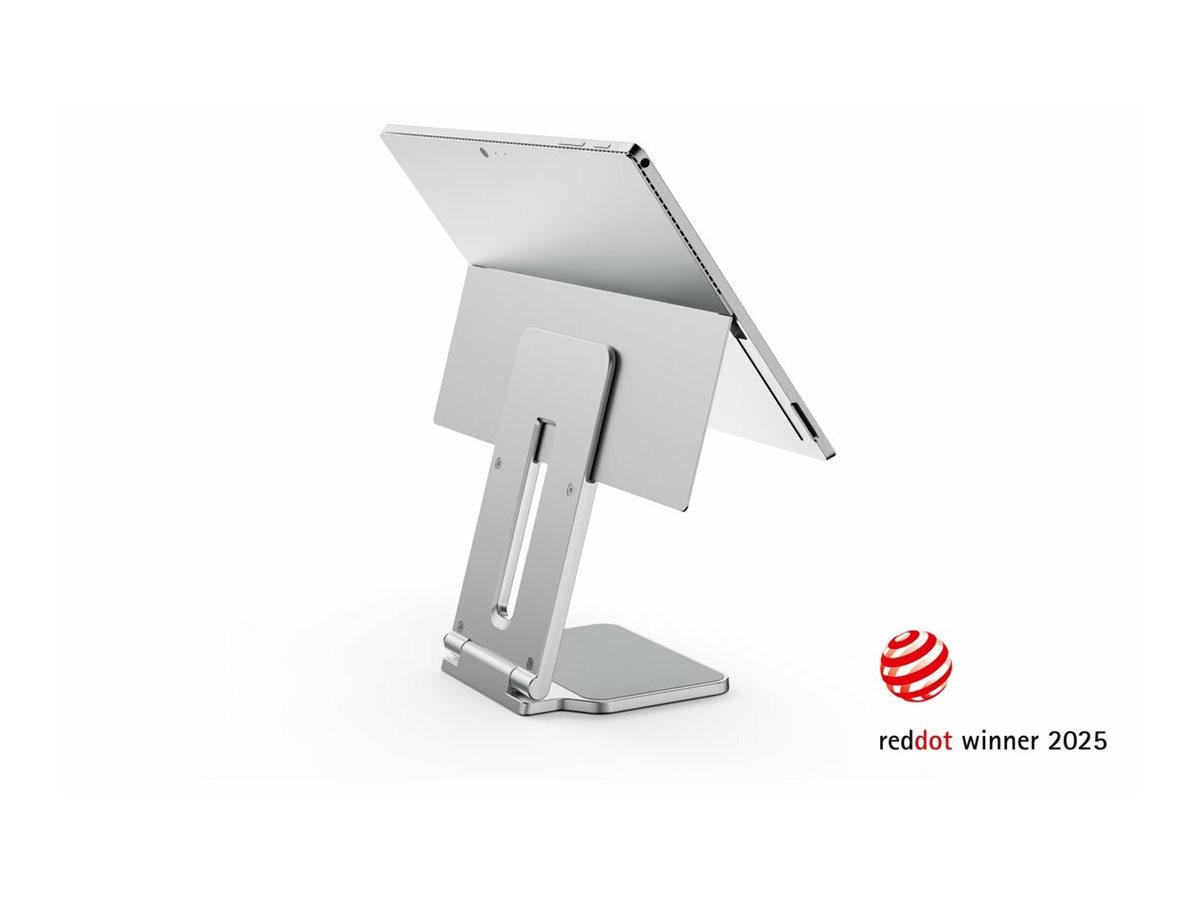 A silver tablet in a folding metal stand on a white background, with a Red Dot Winner 2025 logo on the lower right.