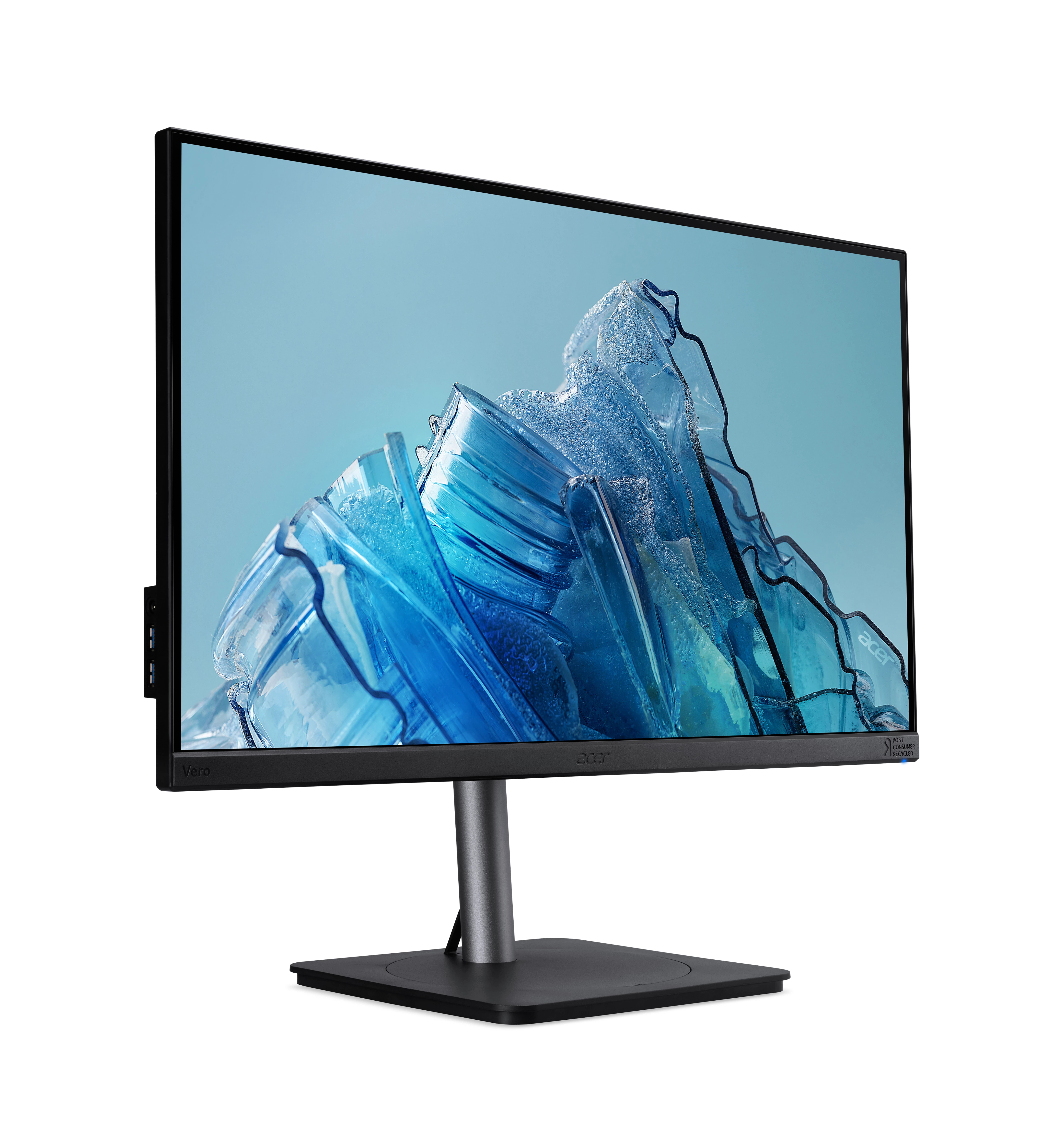 Monitor Acer su supporto nero mostra un design astratto di bottiglia di plastica blu.